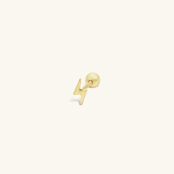 De massief gouden MiJu Official bliksem piercing uit de vintage vibes collectie.